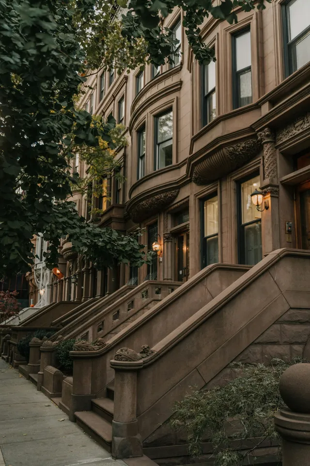 A row of classic NYC brownstone homes